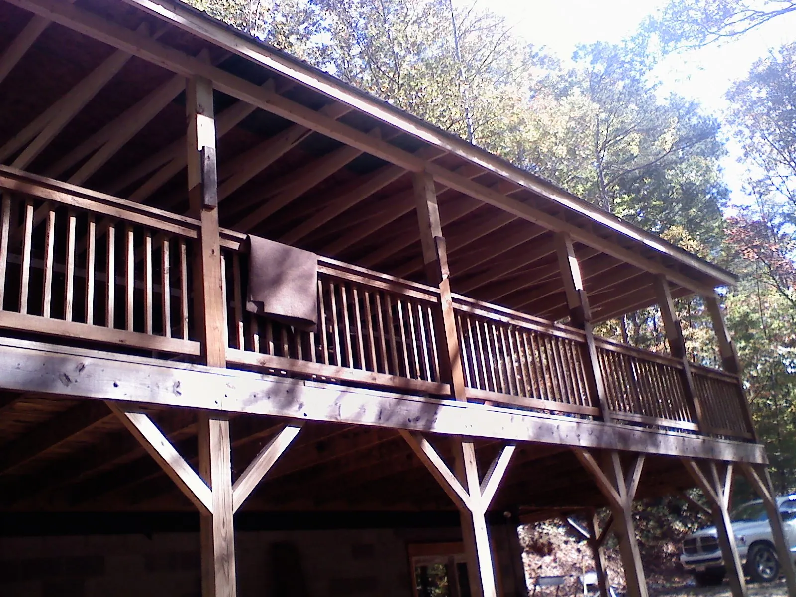 Timber framing under a new elevated porch and deck — Roof Leak Repair in Summer Shade by Roofing Brothers